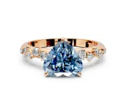 Cluster Engagement Ring Setting for Fancy Blue Heart-Shaped Center with Round Cut Accent Band and Prong Head in Rose Gold
