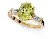 3 Stone Engagement Ring Setting for Fancy Yellow Oval Center with Channel Baguette Accents and Prong Head in Yellow Gold