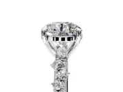 Solitaire Engagement Ring Setting for Round Cut Center with Trailing Leaf Accent Band and Prong Head in Platinum