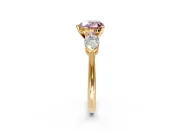 3 Stone Engagement Ring Setting for Fancy Pink Heart-Shaped Center with Large Pear-Shaped Accents and Prong Head in Yellow Gold