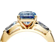 3 Stone Engagement Ring Setting for Fancy Blue Radiant Cut Center with Tapered Baguettes, Plain Band and Prong Head in Yellow Gold