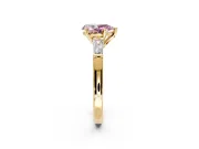 3 Stone Engagement Ring Setting for Fancy Pink Pear-Shaped Center with Tapered Baguettes, Plain Band and Prong Head in Yellow Gold