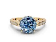 Cathedral Engagement Ring Setting for Fancy Blue Round Cut Center with Antique-Style Pave Band and Prong Head in Yellow Gold