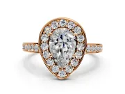 Bezel-Framed Halo Engagement Ring Setting for Pear-Shaped Center with Pave Band and Prong Head in Rose Gold