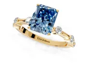 Solitaire Engagement Ring Setting for Fancy Blue Radiant Cut Center with Bezel Station Band and Prong Head in Yellow Gold