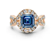 Halo Engagement Ring Setting for Fancy Blue Asscher Cut Center with Pave Infinity Twist Band and Prong Head in Rose Gold