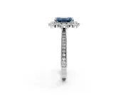 Milgrain Halo Engagement Ring Setting for Fancy Blue Emerald Cut Center with Bezel Point Accents and Prong Head in Platinum