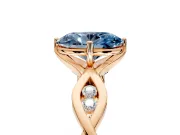 Solitaire Engagement Ring Setting for Fancy Blue Oval Center with Accented Twist Band and Leaf Prong Head in Rose Gold