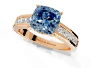 Solitaire Engagement Ring Setting for Fancy Blue Cushion Cut Center with Princess Cut Channel Band and Prong Head in Rose Gold