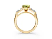 Channel-Set Engagement Ring Setting for Fancy Yellow Round Cut Center with Baguette Band and Prong Head in Yellow Gold