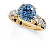 Solitaire Engagement Ring Setting for Fancy Blue Round Cut Center with Graduated Shared Prongs and Prong Head in Yellow Gold