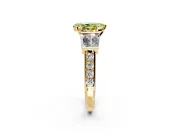 Channel-Set Engagement Ring Setting for Fancy Yellow Pear-Shaped Center with Baguette Band and Prong Head in Yellow Gold