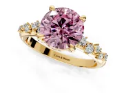 Solitaire Engagement Ring Setting for Fancy Pink Round Cut Center with Trailing Leaf Accent Band and Prong Head in Yellow Gold