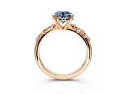 Solitaire Engagement Ring Setting for Fancy Blue Round Cut Center with Trailing Leaf Accent Band and Prong Head in Rose Gold