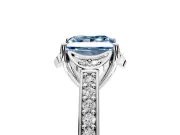 Floral Engagement Ring Setting for Fancy Blue Princess Cut Center with Four Accent Clusters and Prong Head in Platinum