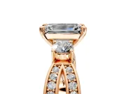 3 Stone Engagement Ring Setting for Emerald Cut Center with Pave Twist Band and Prong Head in Rose Gold