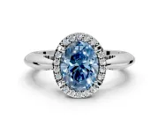 Halo Engagement Ring Setting for Fancy Blue Oval Center with Tapered Plain Band and Prong Head in Platinum