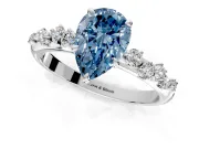 Cluster Engagement Ring Setting for Fancy Blue Pear-Shaped Center with Round Cut Accent Band and Prong Head in Platinum