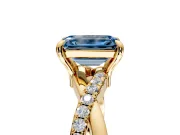 Solitaire Engagement Ring Setting for Fancy Blue Emerald Cut Center with Half-Pave Crossover Band and Prong Head in Yellow Gold