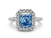 Pave Halo Engagement Ring Setting for Fancy Blue Radiant Cut Center with Single Row Pave Band and Prong Head in Platinum