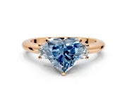 3 Stone Engagement Ring Setting for Fancy Blue Heart-Shaped Center with Wide Plain Band and Prong Head in Rose Gold