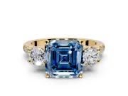 3 Stone Engagement Ring Setting for Fancy Blue Asscher Cut Center with Crossover Basket, Pave Band and Prong Head in Yellow Gold