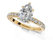 Solitaire Engagement Ring Setting for Pear-Shaped Center with Round Cut Pave Band and Prong Head in Yellow Gold