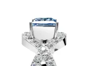 Halo Engagement Ring Setting for Fancy Blue Princess Cut Center with Pave Infinity Twist Band and Prong Head in White Gold