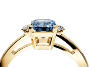 3 Stone Engagement Ring Setting for Fancy Blue Emerald Cut Center with Low-Set Round Cut Accents and Prong Head in Yellow Gold