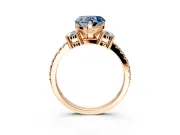 3 Stone Engagement Ring Setting for Fancy Blue Heart-Shaped Center with Round Cut Side Accents and Prong Head in Rose Gold