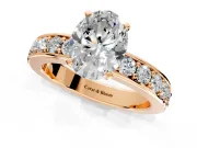Solitaire Engagement Ring Setting for Oval Center with Channel-Set Accents and Prong Head in Rose Gold