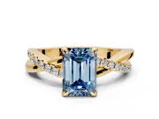 Solitaire Engagement Ring Setting for Fancy Blue Emerald Cut Center with Half-Pave Crossover Band and Prong Head in Yellow Gold