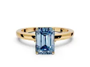 Solitaire Engagement Ring Setting for Fancy Blue Emerald Cut Center with Plain Band and Tulip Prong Head in Yellow Gold