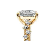 Solitaire Engagement Ring Setting for Radiant Cut Center with Trailing Leaf Accent Band and Prong Head in Yellow Gold