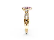 3 Stone Engagement Ring Setting for Fancy Pink Pear-Shaped Center with Pave Split Shank and Prong Head in Yellow Gold