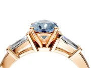 3 Stone Engagement Ring Setting for Fancy Blue Pear-Shaped Center with Channel Baguette Accents and Prong Head in Rose Gold