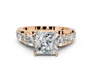 Solitaire Engagement Ring Setting for Princess Cut Center with Graduated Shared Prongs and Prong Head in Rose Gold