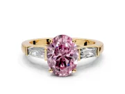 3 Stone Engagement Ring Setting for Fancy Pink Oval Center with Tapered Baguettes, Plain Band and Prong Head in Yellow Gold