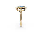 Bezel-Framed Halo Engagement Ring Setting for Fancy Blue Pear-Shaped Center with Pave Band and Prong Head in Yellow Gold