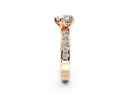 Solitaire Engagement Ring Setting for Heart-Shaped Center with Channel-Set Accents and Prong Head in Rose Gold