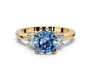 3 Stone Engagement Ring Setting for Fancy Blue Cushion Cut Center with Wide Plain Band and Prong Head in Yellow Gold