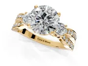 3 Stone Engagement Ring Setting for Round Cut Center with Pave Twist Band and Prong Head in Yellow Gold