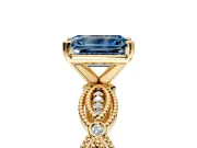 Solitaire Engagement Ring Setting for Fancy Blue Emerald Cut Center with Marquise Panel Band and Prong Head in Yellow Gold
