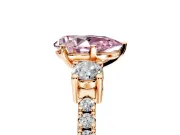 3 Stone Engagement Ring Setting for Fancy Pink Pear-Shaped Center with Round Cut Side Accents and Prong Head in Rose Gold