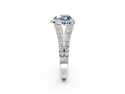 Halo Engagement Ring Setting for Fancy Blue Heart-Shaped Center with Narrow Pave Split Shank and Prong Head in Platinum