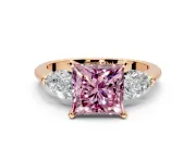 3 Stone Engagement Ring Setting for Fancy Pink Princess Cut Center with Large Pear-Shaped Accents and Prong Head in Rose Gold