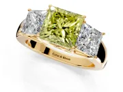 3 Stone Engagement Ring Setting for Fancy Yellow Princess Cut Center with Raised Basket Heads and Prong Head in Yellow Gold