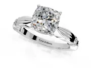 Solitaire Engagement Ring Setting for Cushion Cut Center with Carved Leaf Shoulders and Prong Head in Platinum