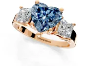 3 Stone Engagement Ring Setting for Fancy Blue Heart-Shaped Center with Matching Side Accents and Prong Head in Rose Gold