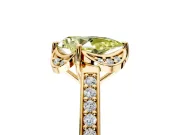 Floral Engagement Ring Setting for Fancy Yellow Pear-Shaped Center with Four Accent Clusters and Prong Head in Yellow Gold